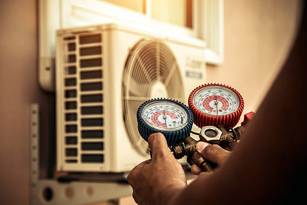 Professional Air Conditioning Service technician working in Hookstown, PA